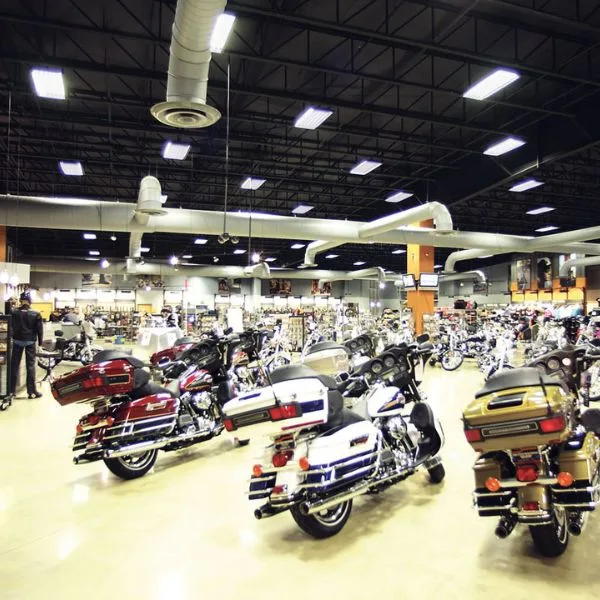 Powerful linear high bay lights delivering optimal illumination and clarity over long distances in a wholesale distribution center