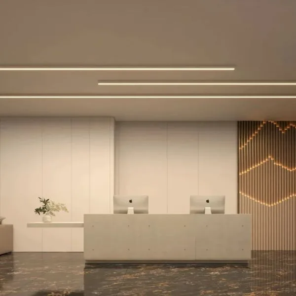 Architectural surface linear light integrated into a minimalist interior with clean ceiling geometry